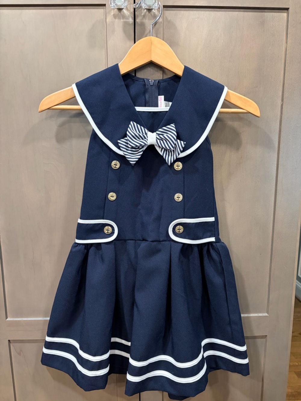 Bonnie Jean Navy Dress with White Trim and Striped Bow Accent